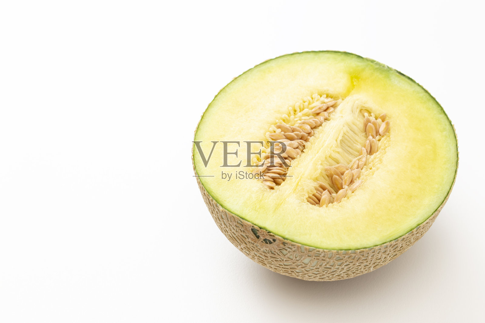 新鲜的哈密瓜在白色背景上。照片摄影图片