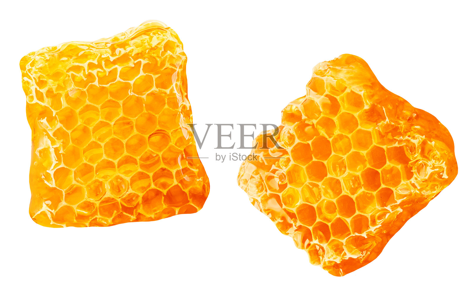 蜂窝与流动的蜂蜜糖浆，背景为白色。蜂蜜平铺。俯视图。平铺。包装设计元素。照片摄影图片