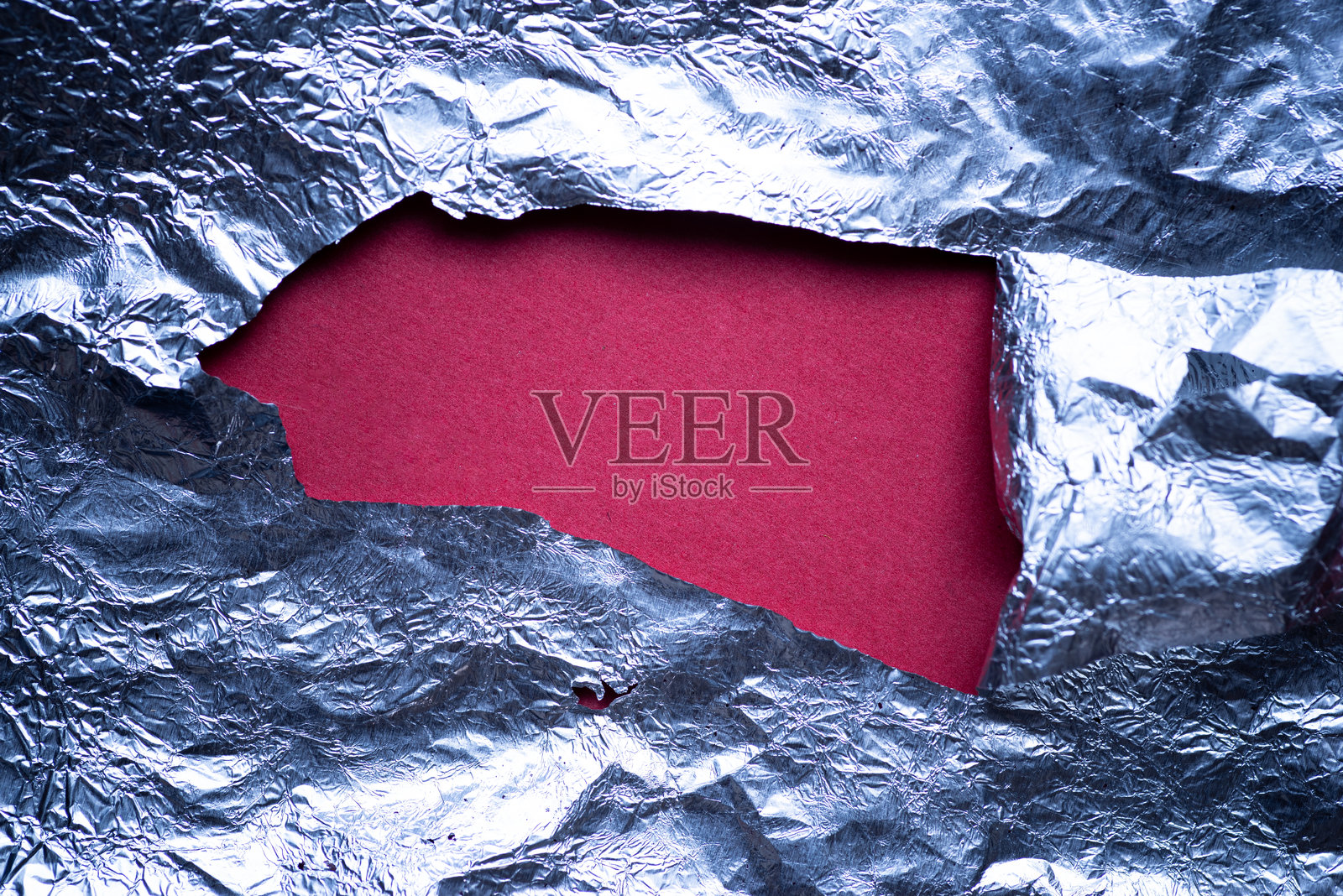 带孔的铝箔照片摄影图片