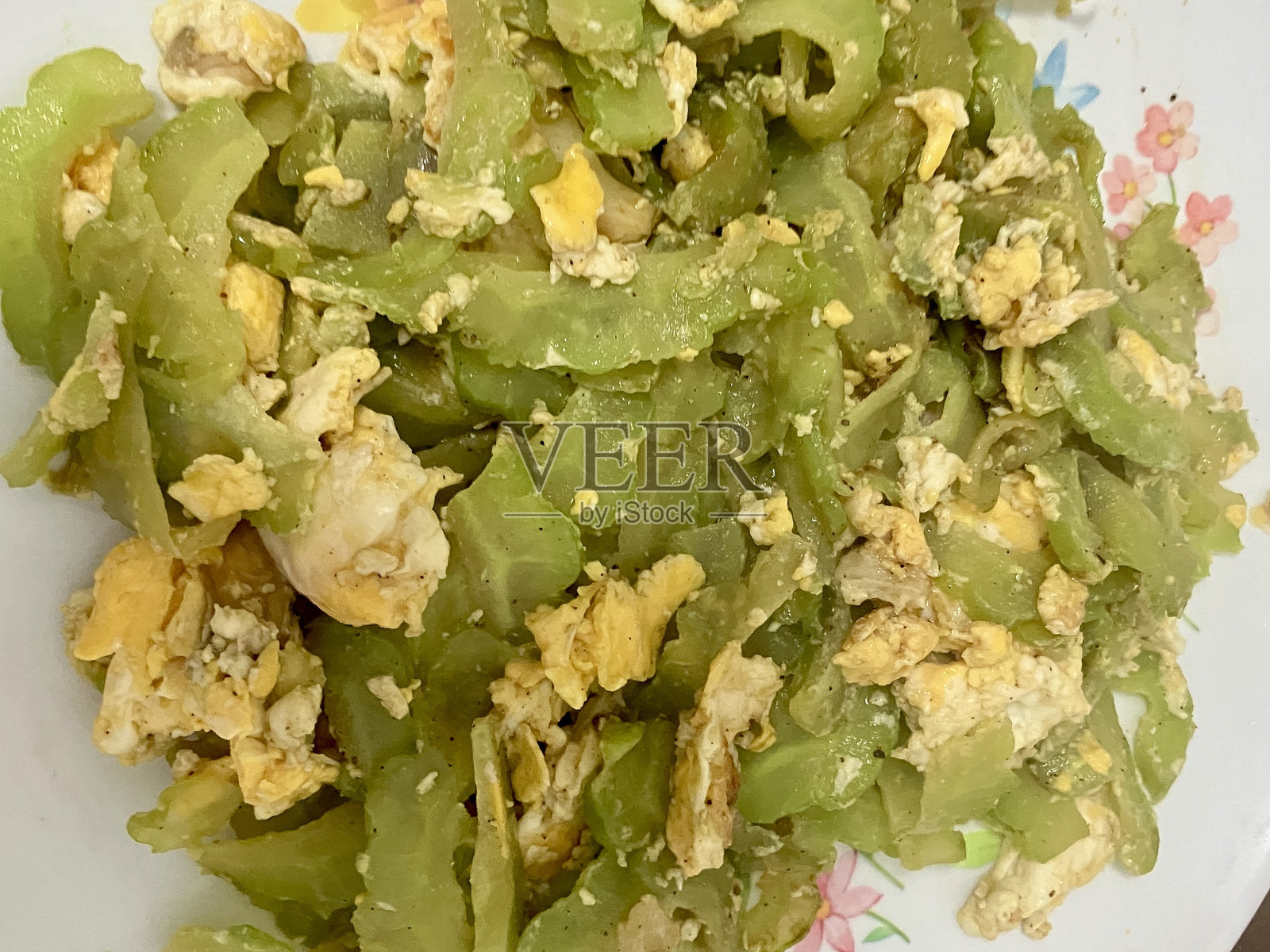 苦瓜炒蛋照片摄影图片