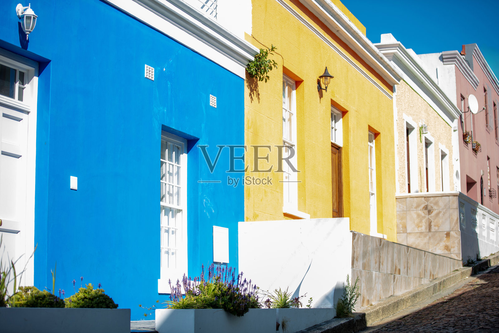 南非。开普敦博卡普社区，色彩鲜艳的房屋照片摄影图片