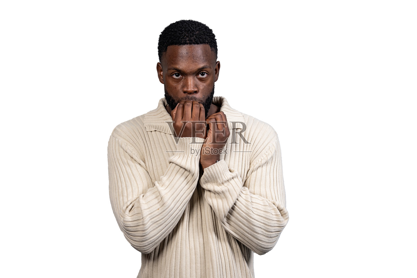 沉思的年轻男子在白色背景下咬指甲照片摄影图片