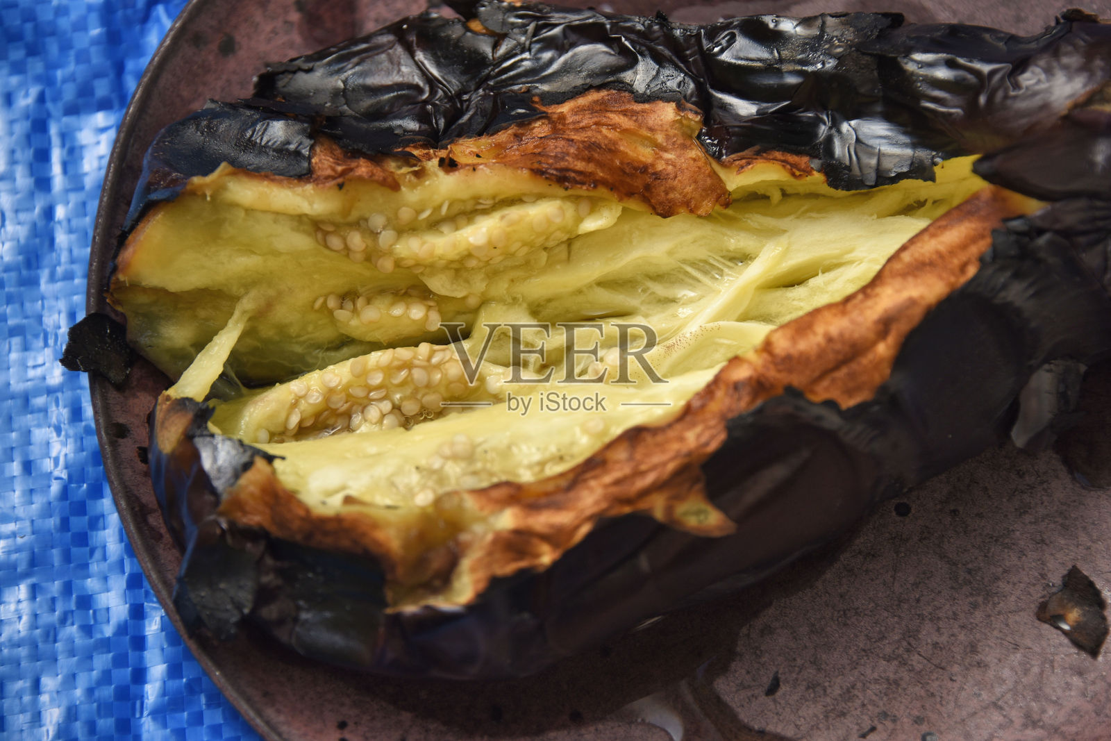 明火烤茄子照片摄影图片