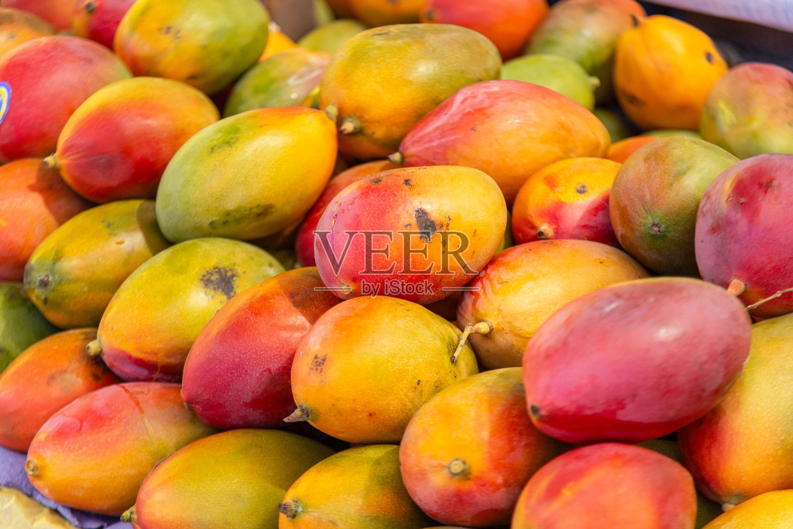 市场上成熟芒果的特写镜头照片摄影图片