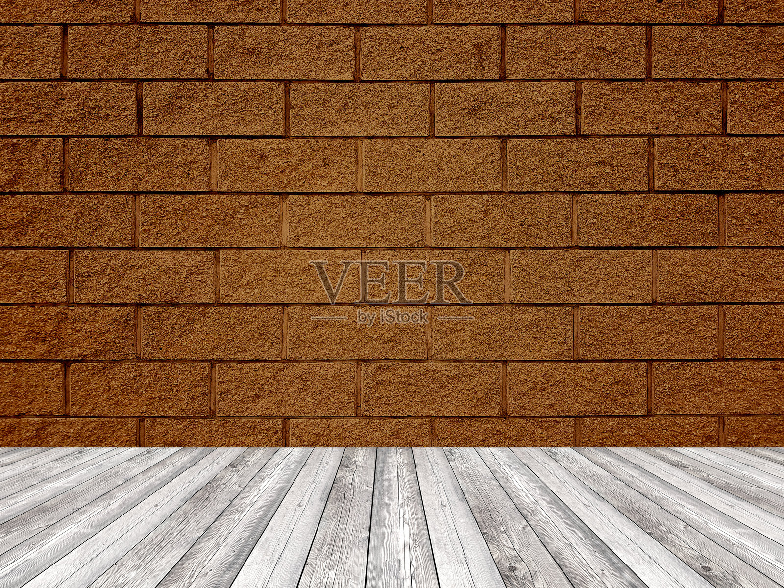 带有规则形状和粗糙表面的砖墙。空旷的棕色背景和地面。照片摄影图片