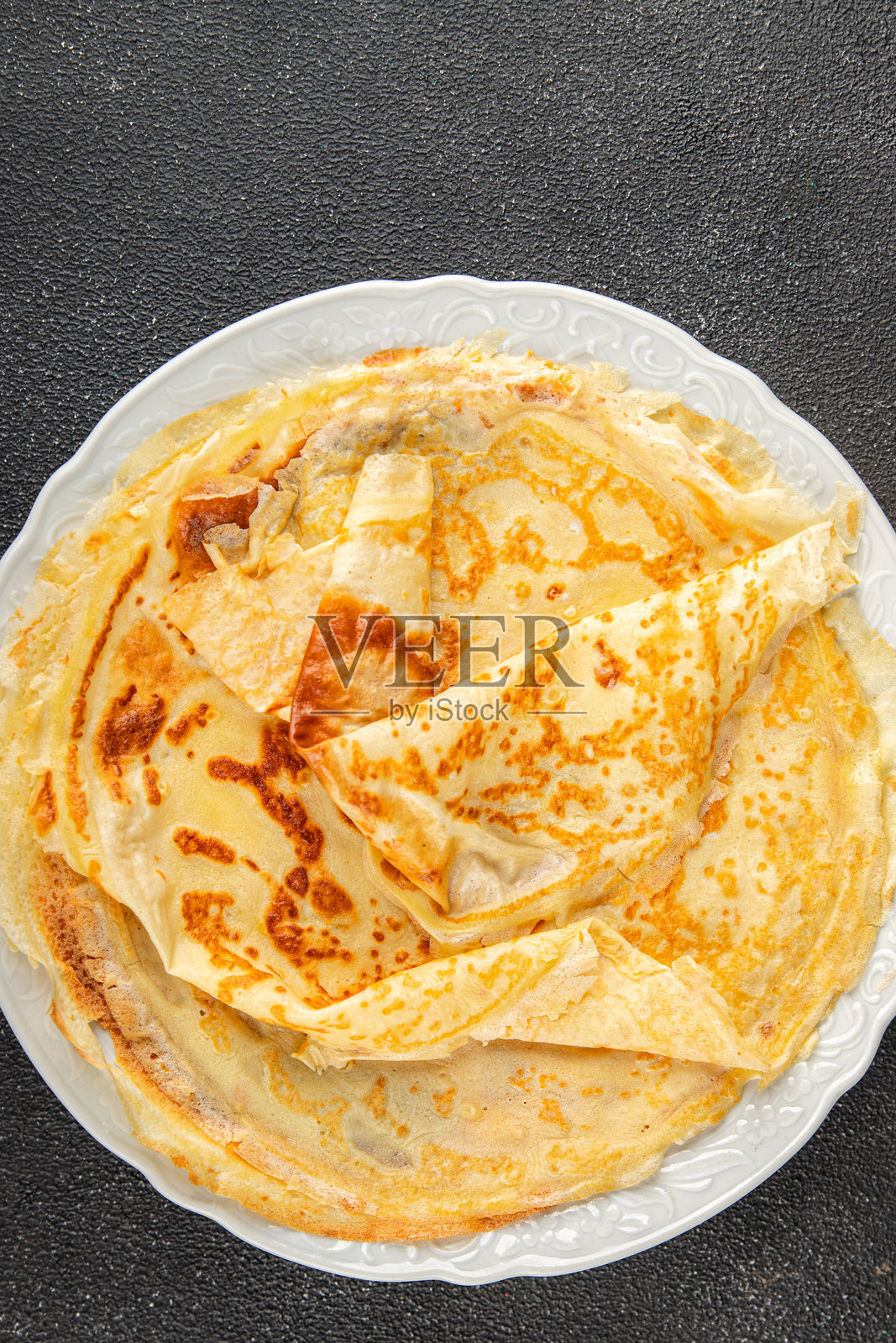 可丽饼甜早餐或甜点美味食品新鲜美味的美食背景在桌子上乡村风格的食物俯视图留白照片摄影图片