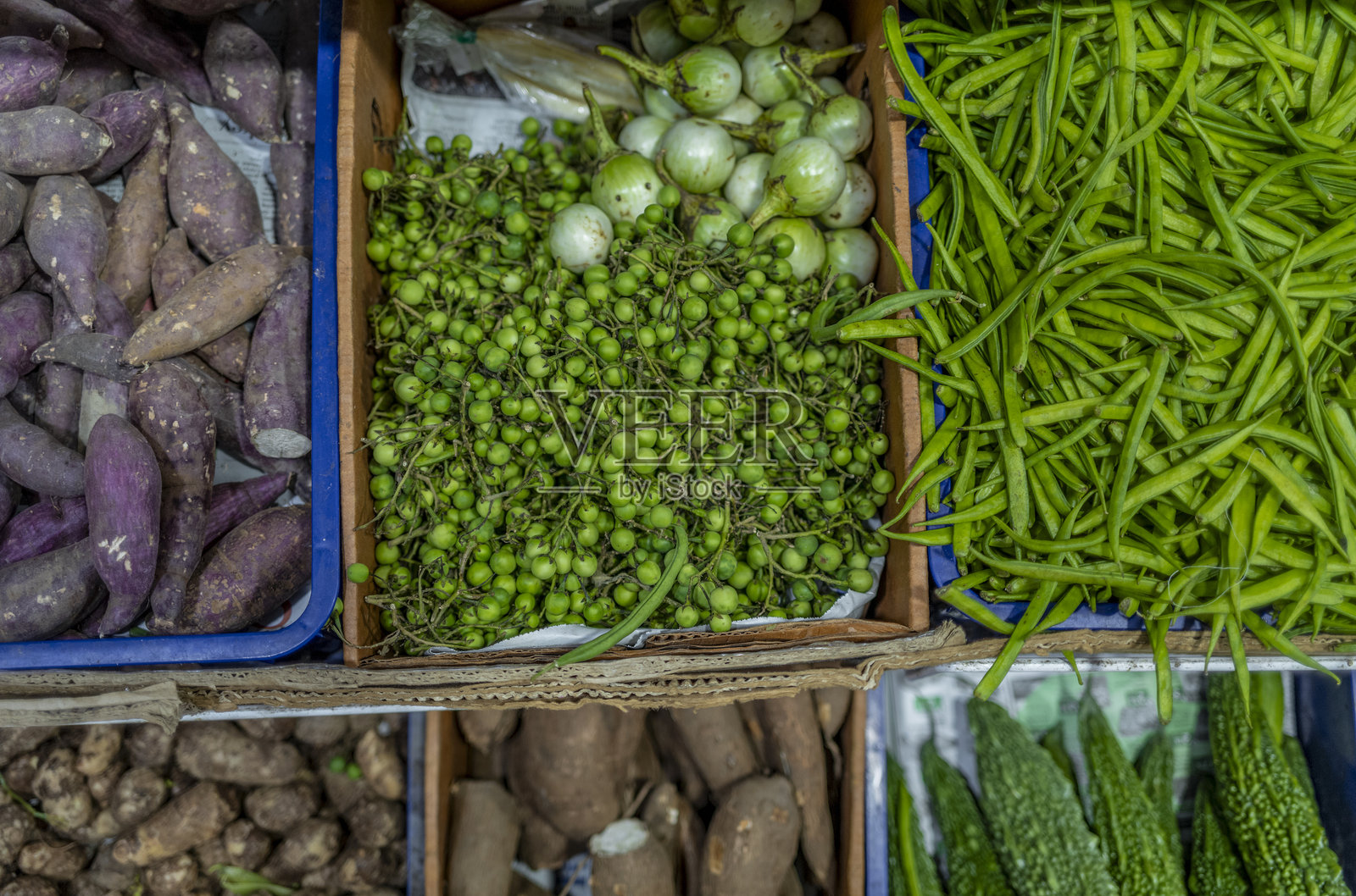 新加坡市场摊位上出售的新鲜亚洲蔬菜照片摄影图片