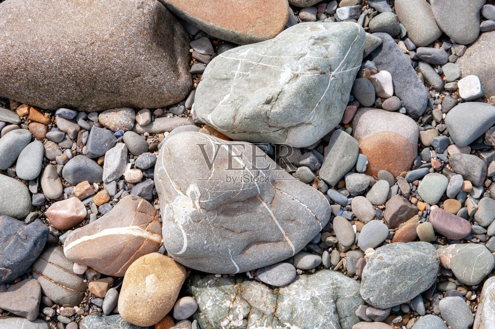 一堆石头上有几条白线照片摄影图片