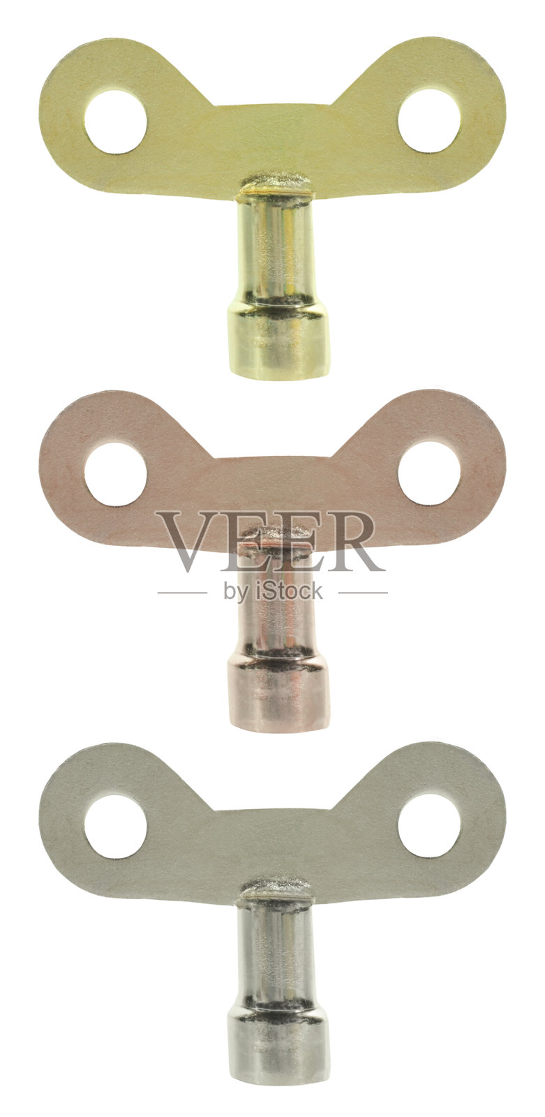 用于上发条钟表或玩具的钥匙发条器，背景为白色，三种颜色。照片摄影图片