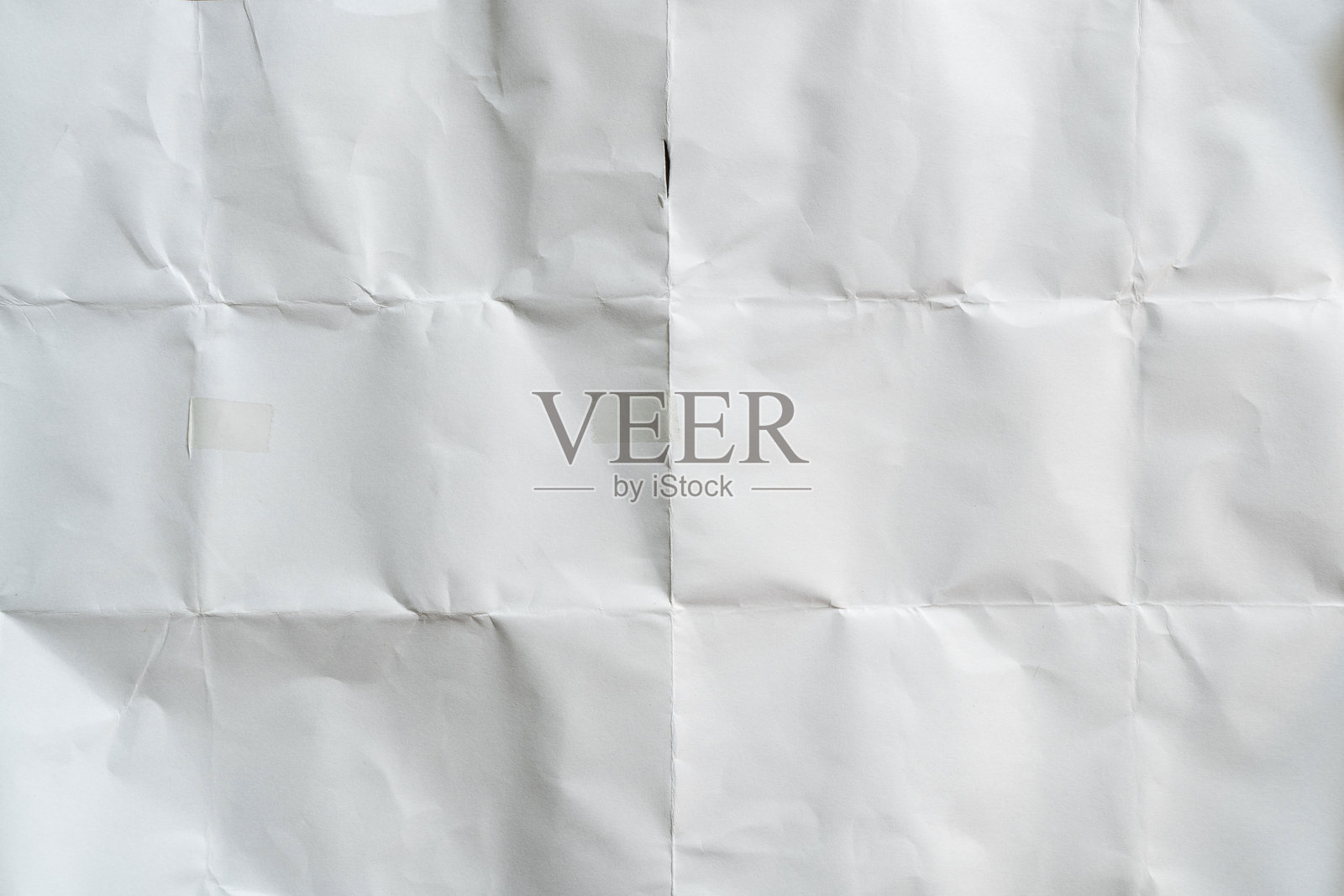 带有复杂褶皱和细微皱纹的白纸照片摄影图片