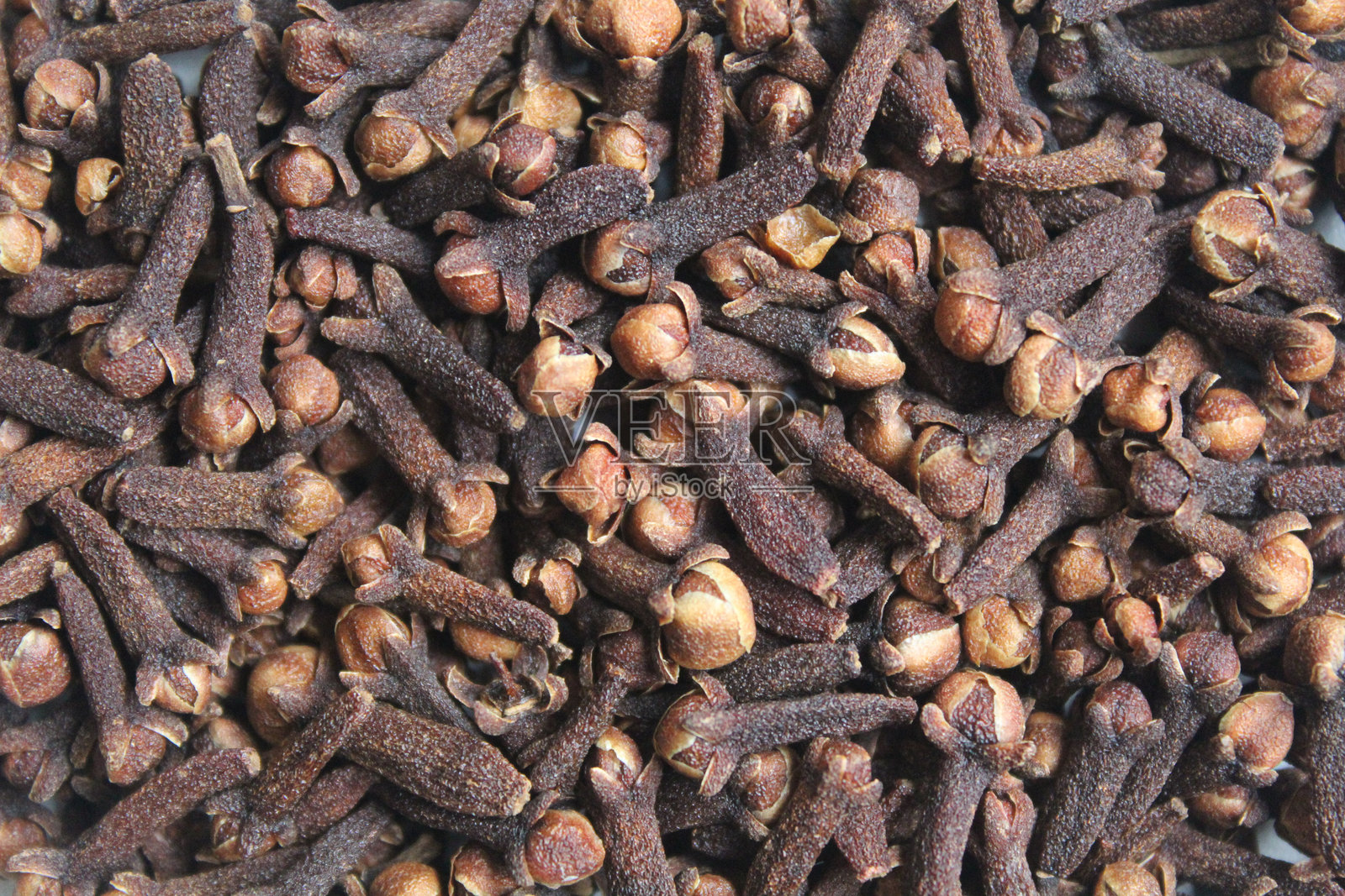 干丁香或丁香花蕾的背景纹理照片摄影图片