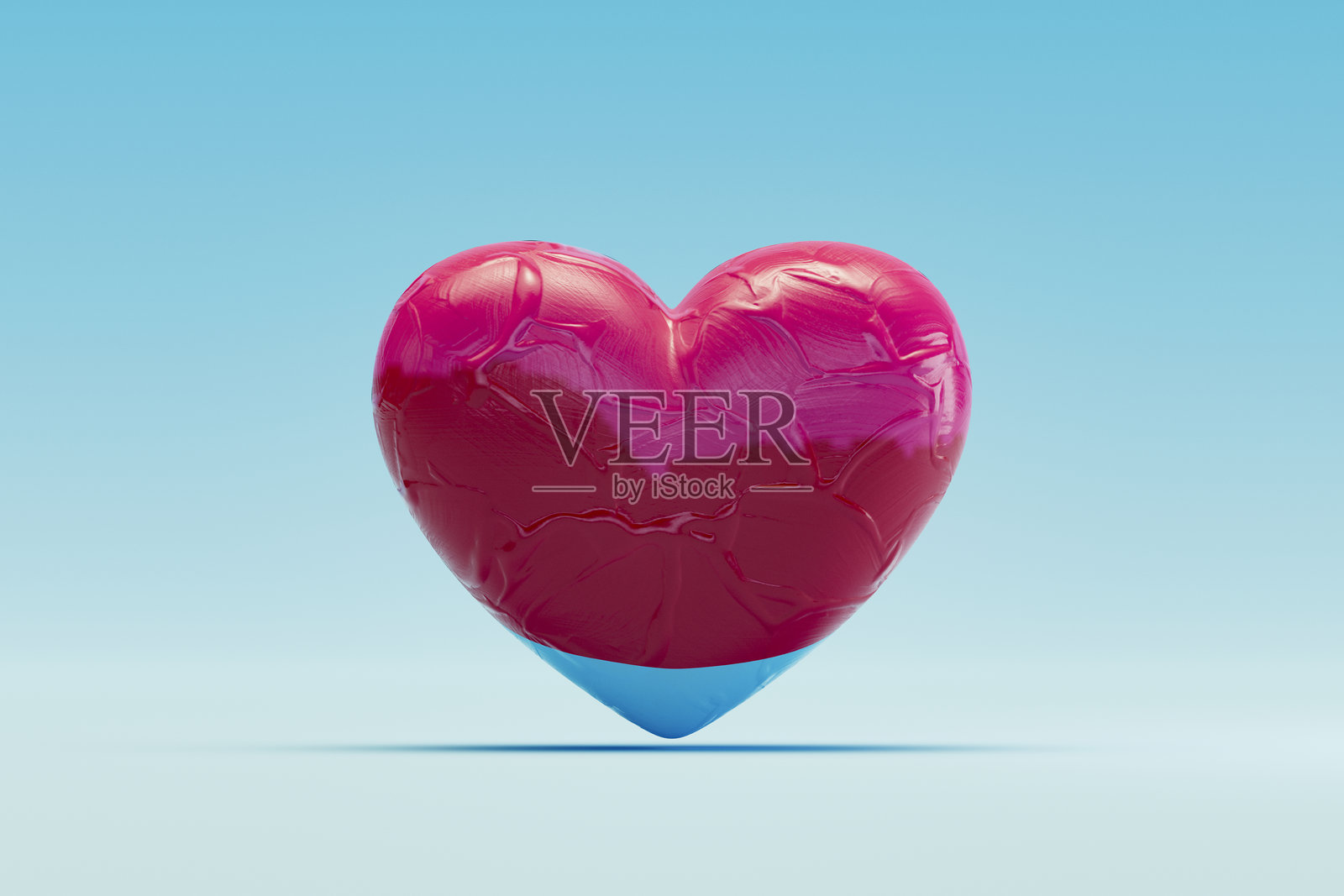 蓝色背景上的心形，情人节概念照片摄影图片