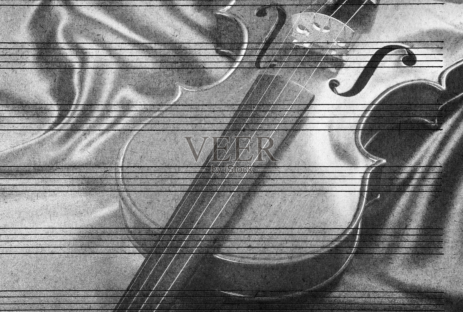 音乐概念。黑白小提琴与乐谱纸。旋律概念照片摄影图片