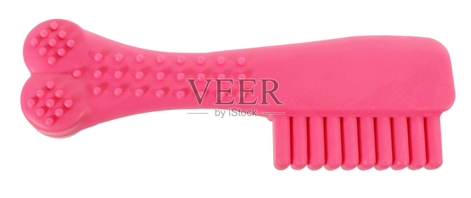 粉色狗骨头宠物玩具，带有刺状牙刷，适合咀嚼，孤立在白色背景上。适合狗狗的有趣宠物概念。照片摄影图片