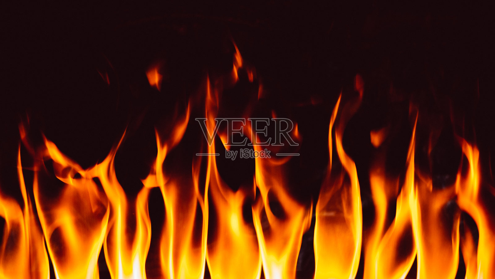 黑色背景上的火焰纹理背景照片摄影图片