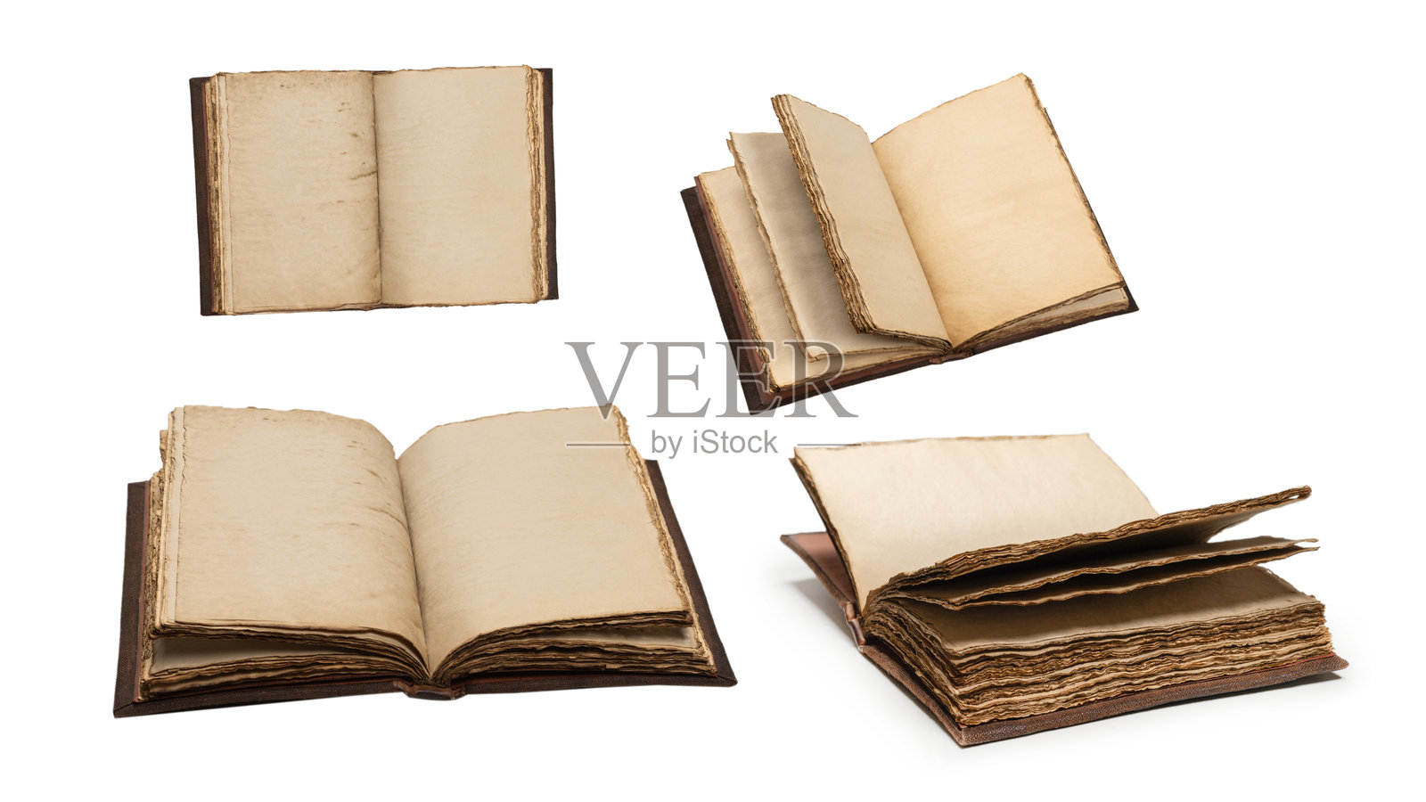 一个孤立在白色背景上的空旧笔记本。照片摄影图片