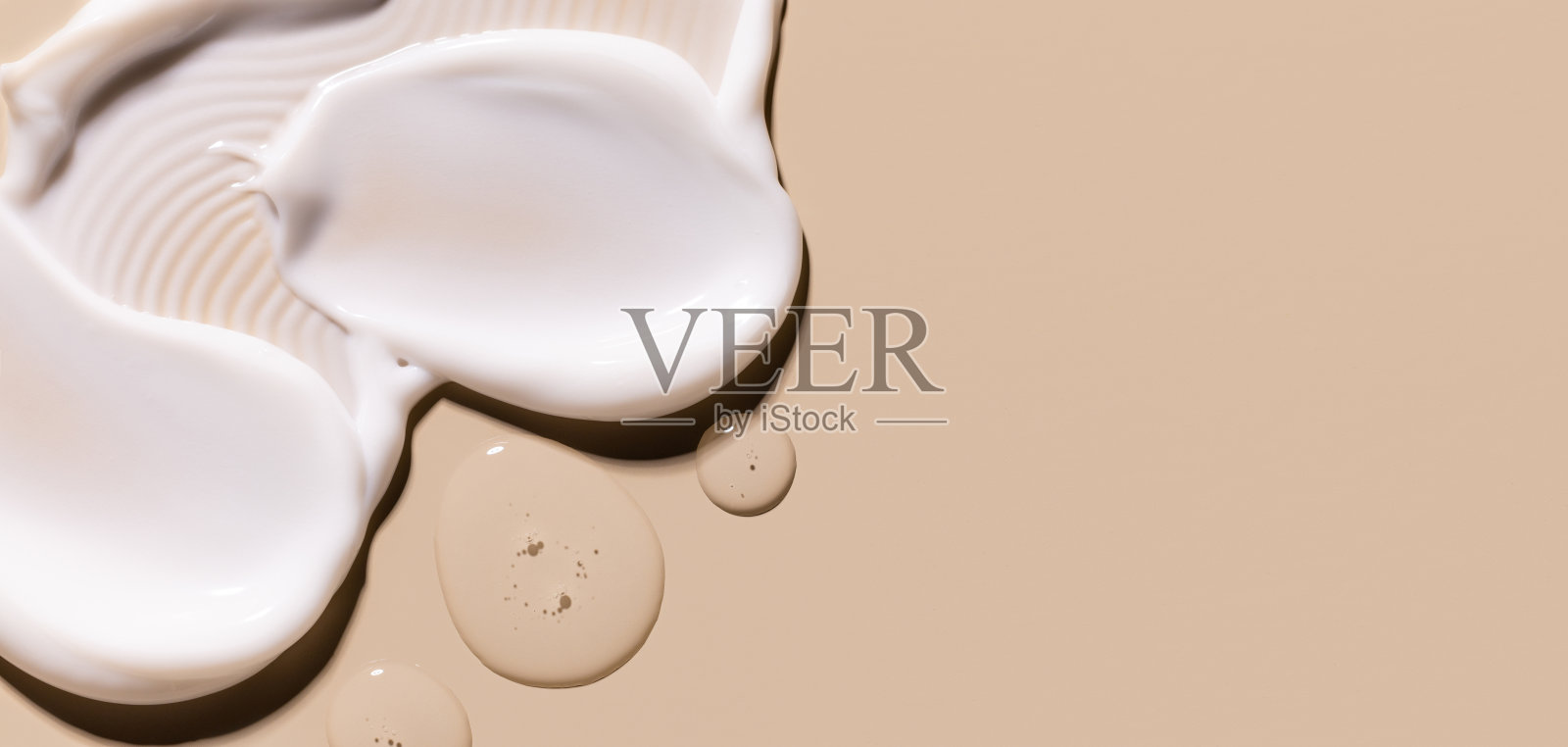 化妆品护理产品的样本，奶油质地涂抹在米色背景上照片摄影图片
