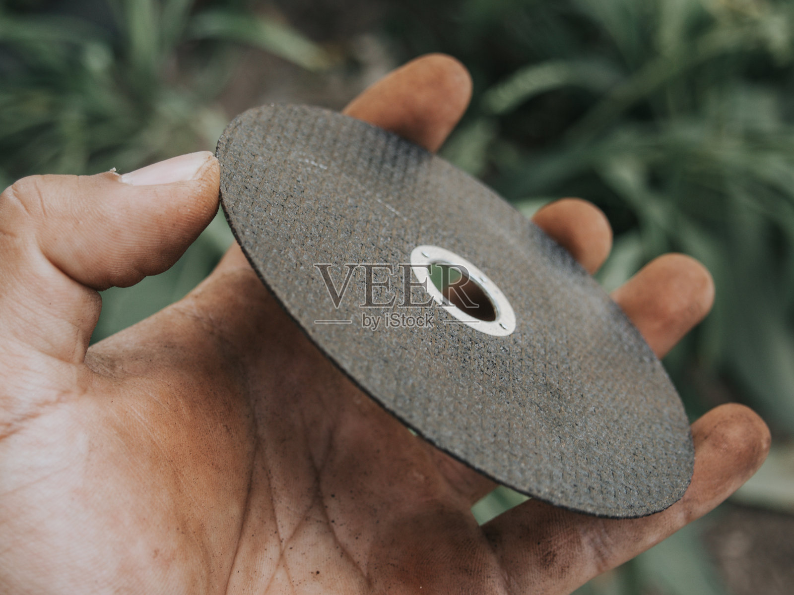 黑色角磨机刀片照片摄影图片