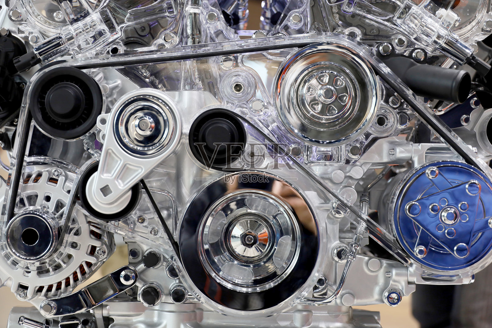 透明塑料制成的皮带传动结构，用于传递动力照片摄影图片