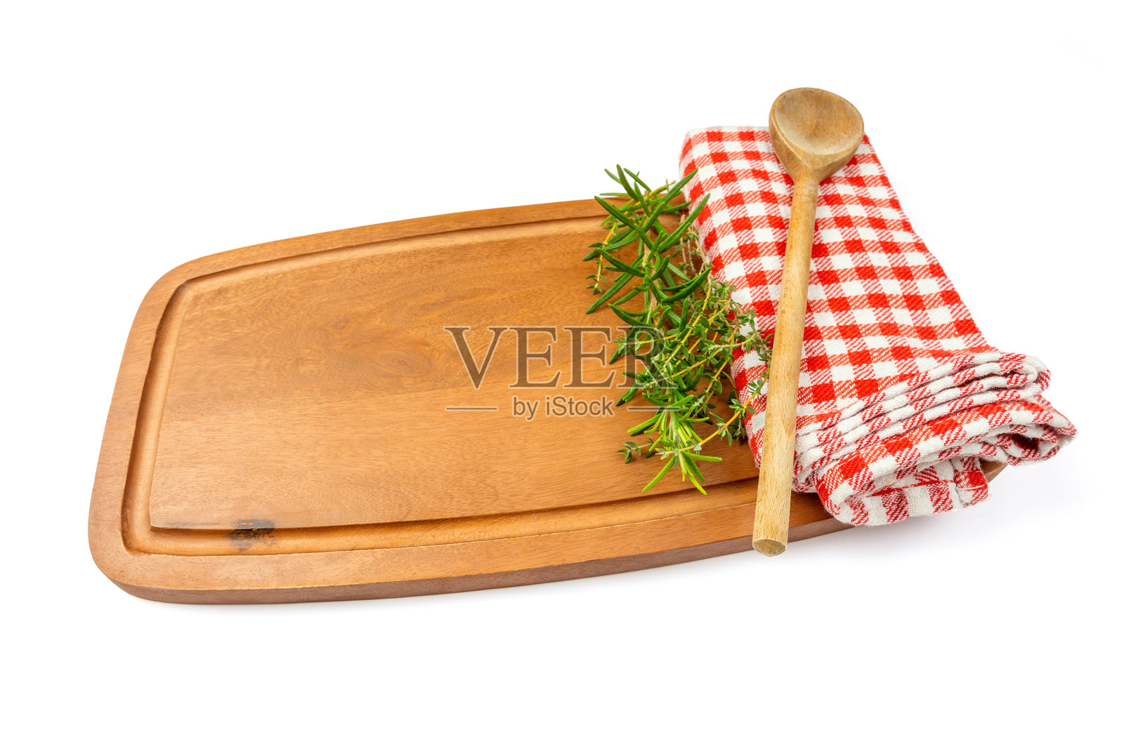 切菜板和茶巾，孤立在白色背景上照片摄影图片