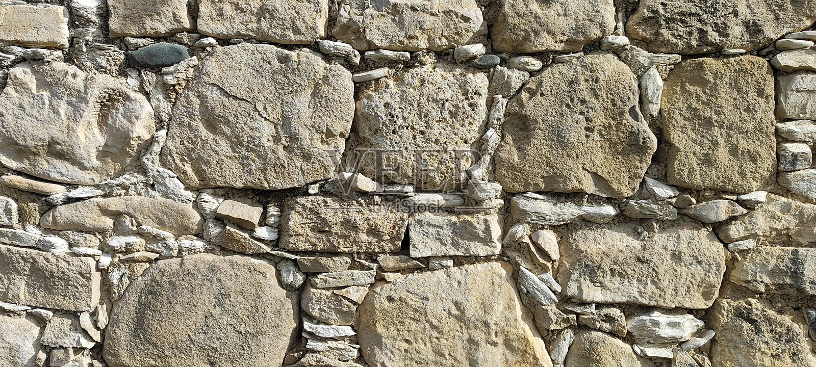 石墙照片，纹理背景。照片摄影图片