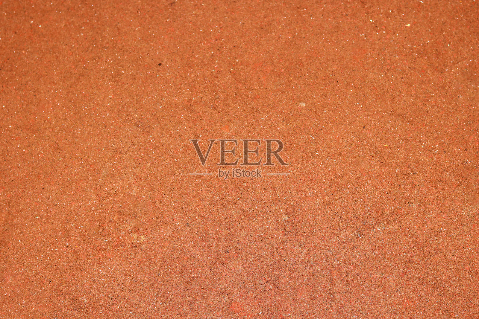 橙色水泥墙面纹理特写，适合用作背景并留有空白区域。照片摄影图片