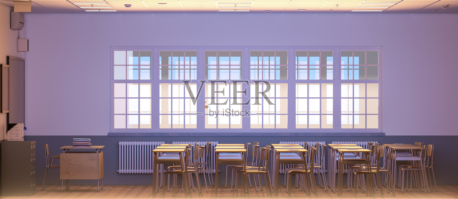 空荡荡的教室里，桌椅静静地等待着学生的到来照片摄影图片