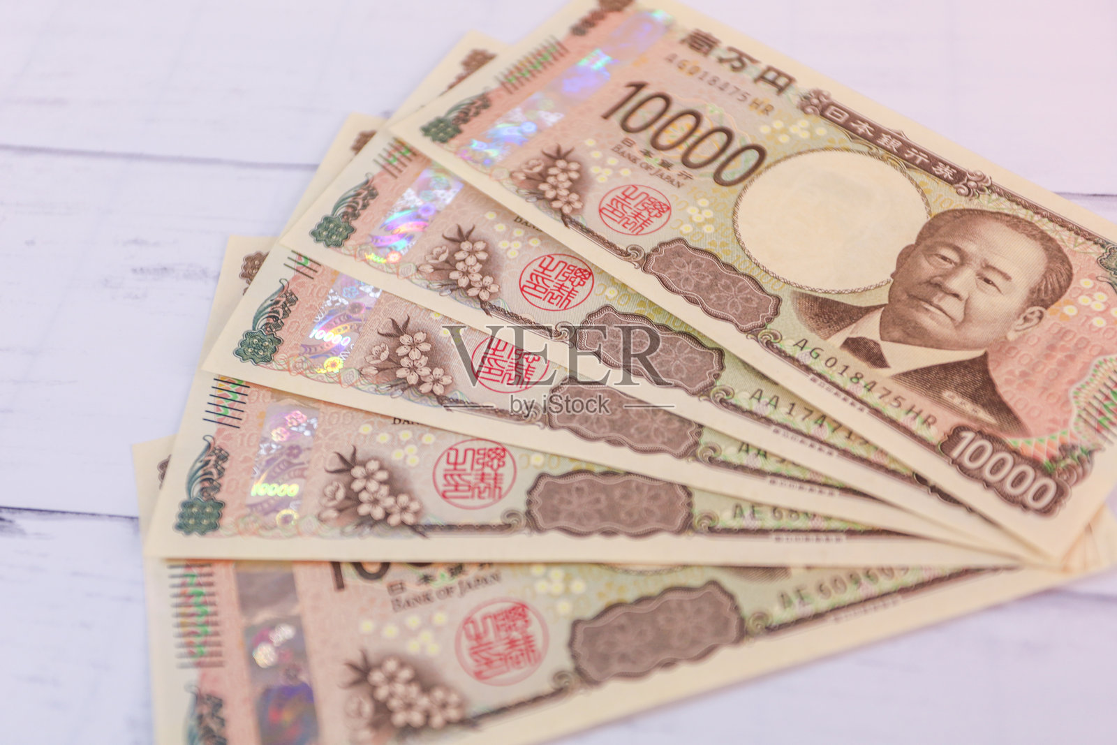新款一万日元纸币展开。照片摄影图片