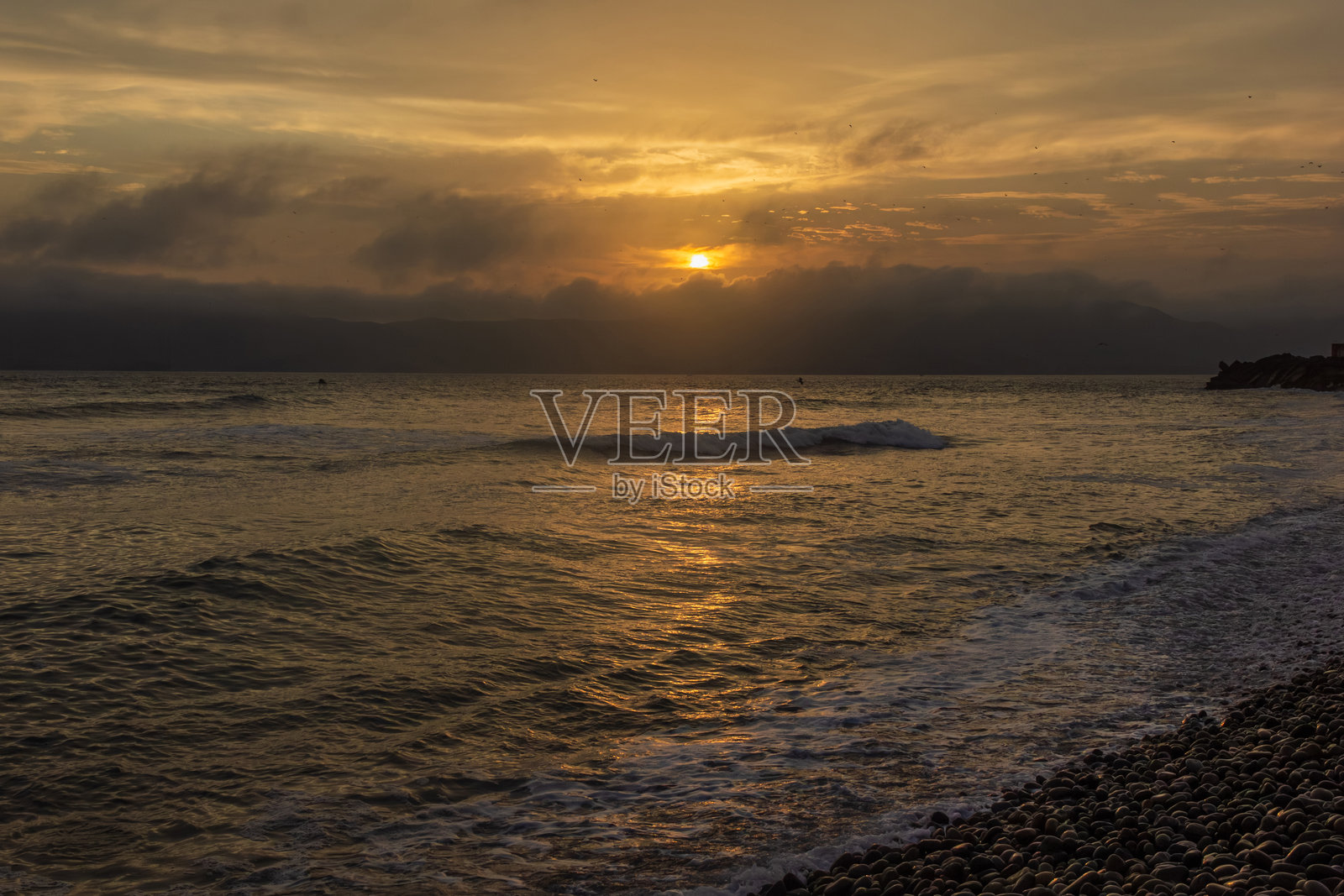 拉庞塔区马雷孔帕尔多海滩的日落照片摄影图片