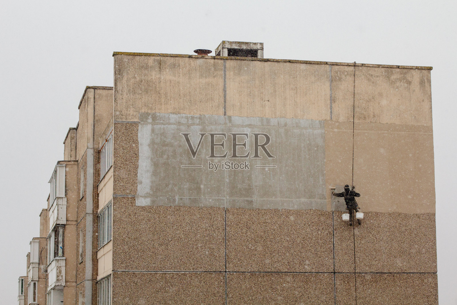 工业攀登者在工作照片摄影图片