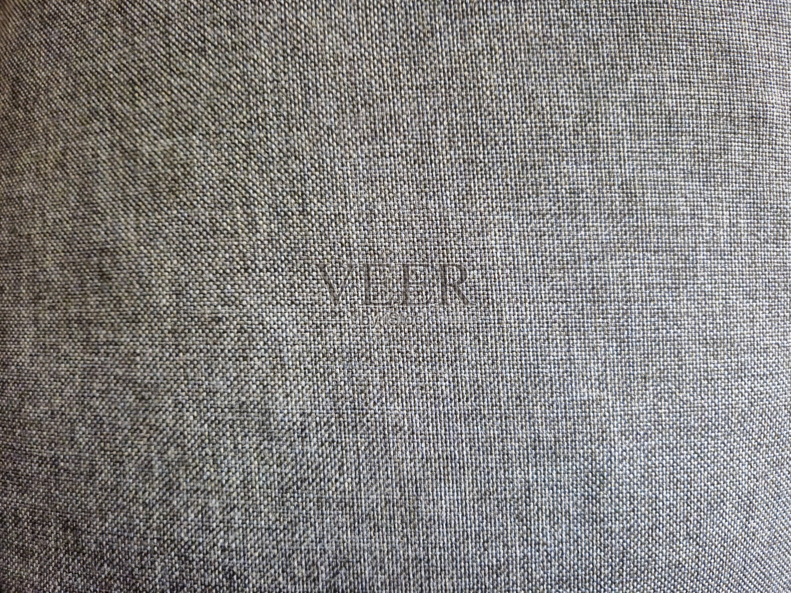 灰色调的纹理面料特写，适合用作背景或设计项目。照片摄影图片