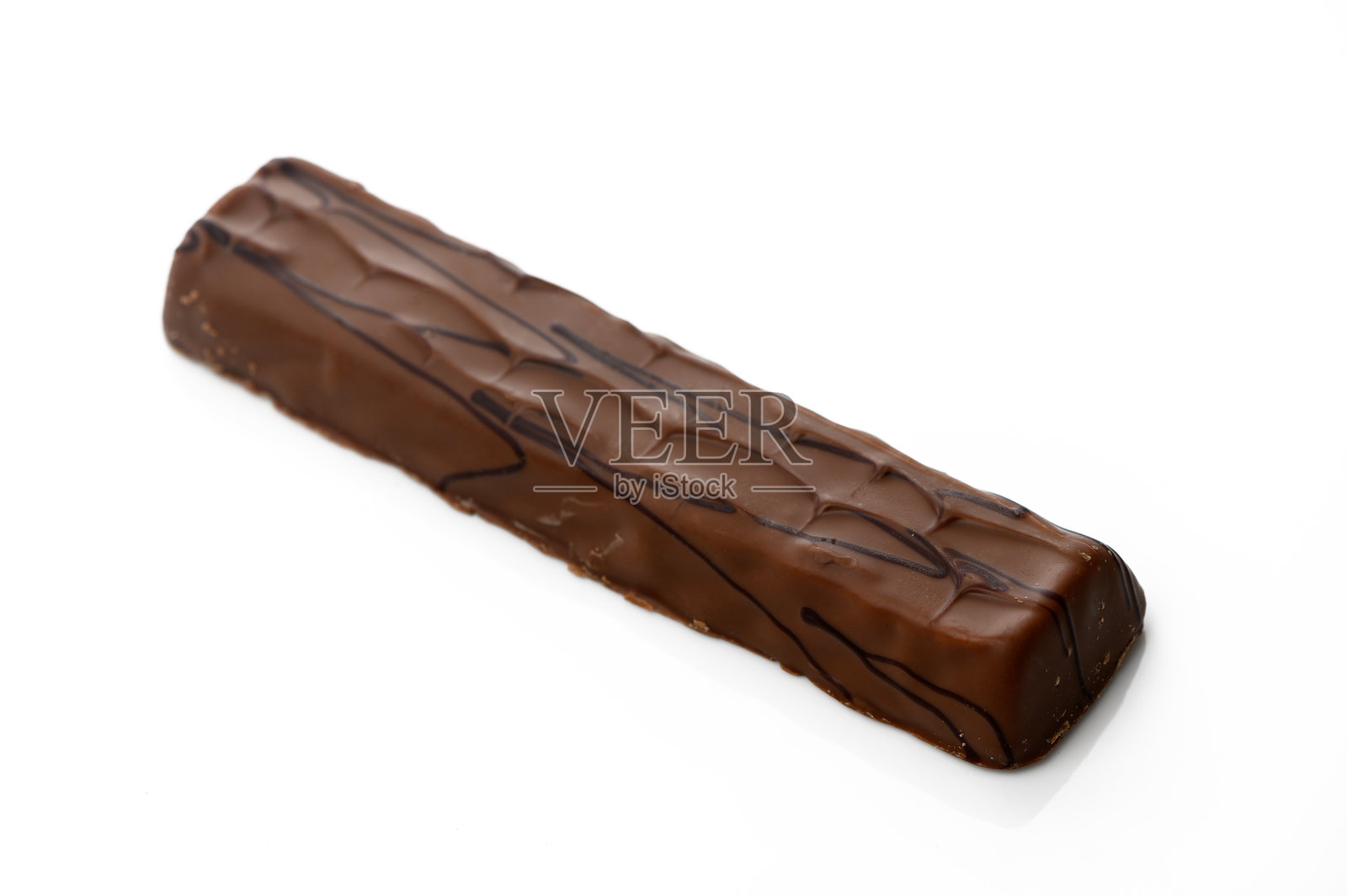 沉浸在甜蜜的享受中，等待品尝的浓郁巧克力糖果棒照片摄影图片