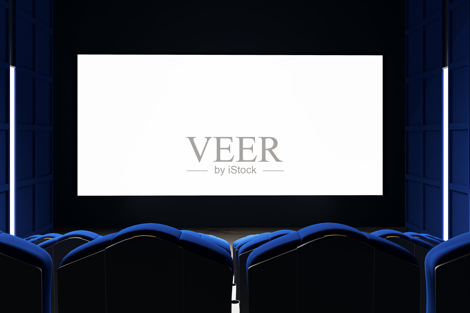 现代影院中空白的银幕，蓝色座椅和昏暗的室内，正面视角，非常适合品牌推广或活动宣传。3D渲染照片摄影图片