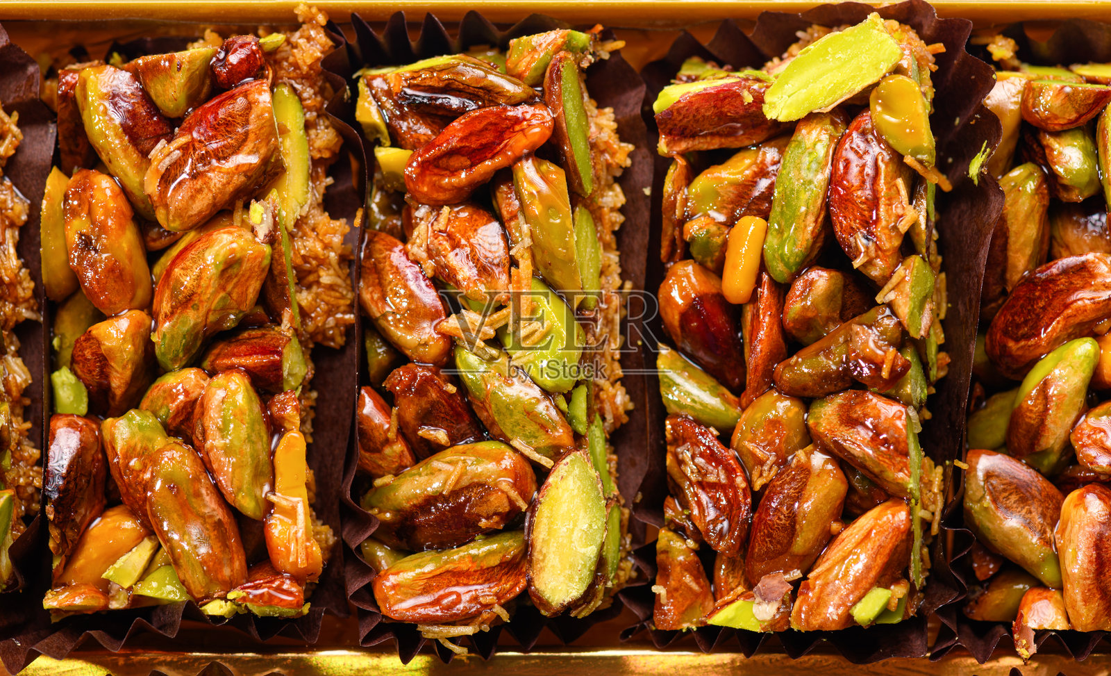 甜食土耳其软糖，传统美食，酥脆的开心果棒，燕麦片照片摄影图片