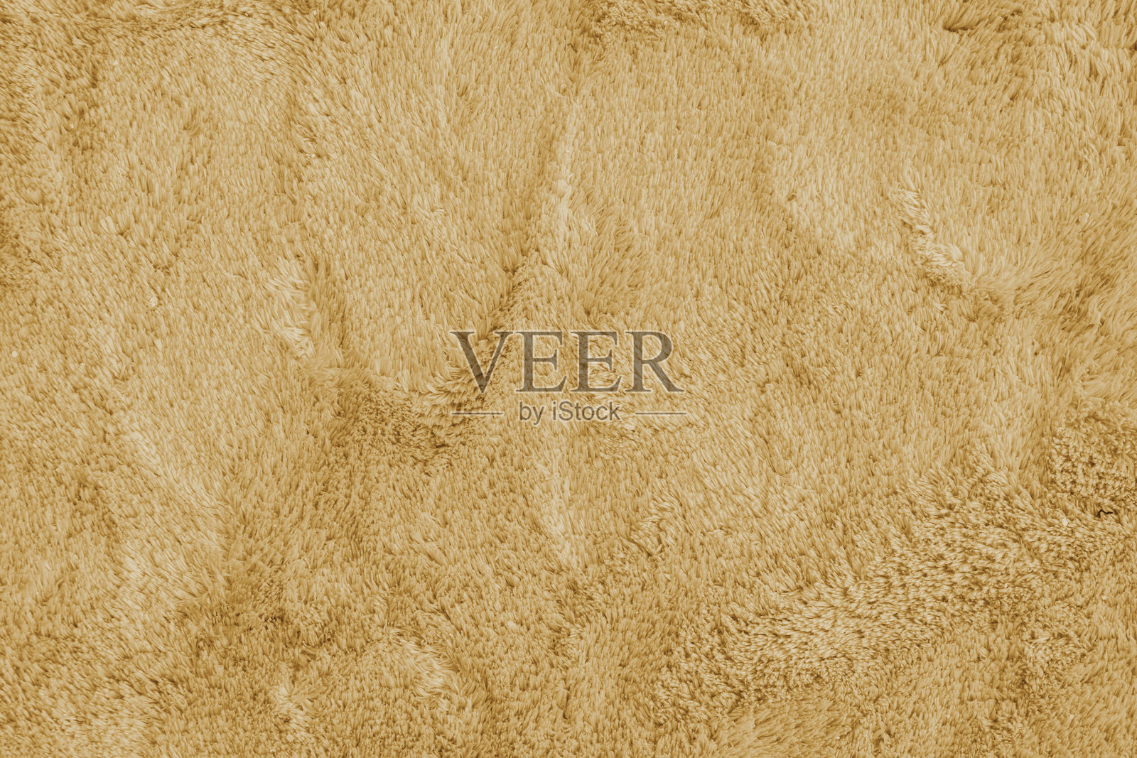 柔软蓬松的黄色地毯纹理，合成纺织毛，绒毛背景照片摄影图片