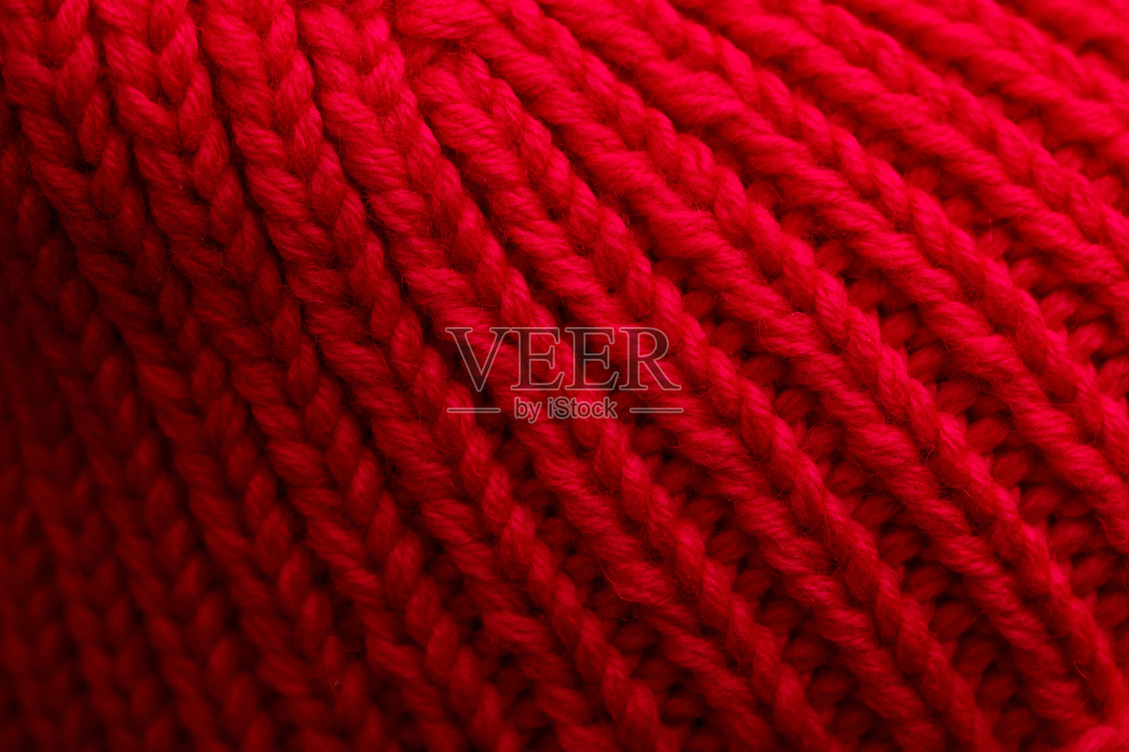 红色针织毛衣的特写镜头照片摄影图片