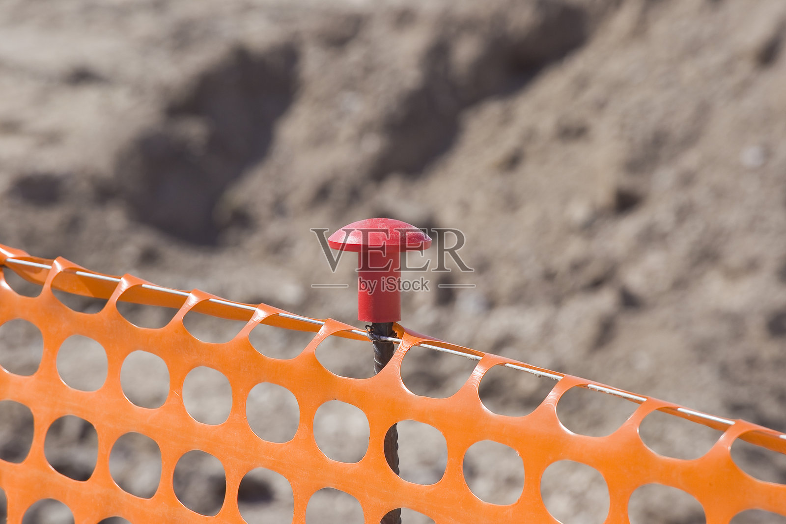 建筑工地区域的塑料安全网以划定施工活动照片摄影图片