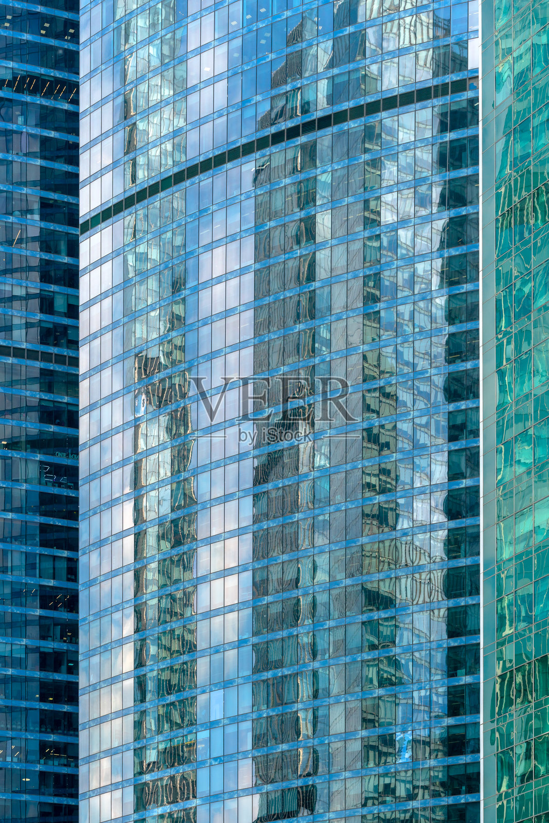 现代建筑的玻璃外立面。照片摄影图片