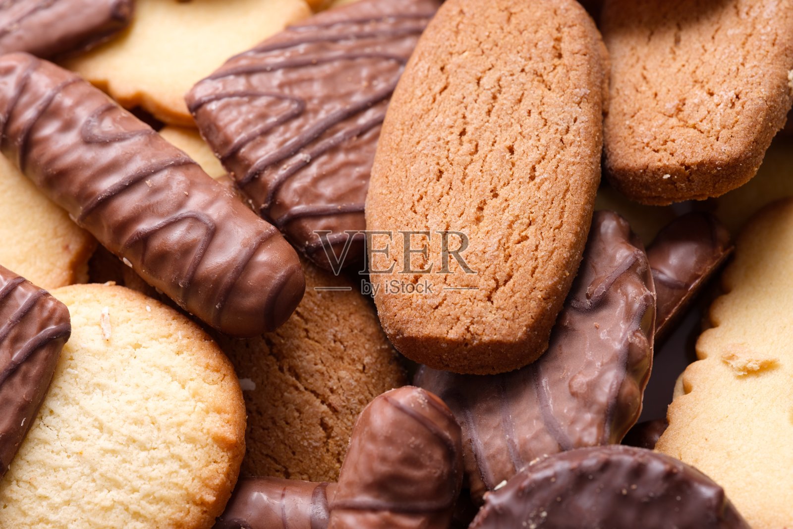 各种饼干的堆叠特写照片摄影图片