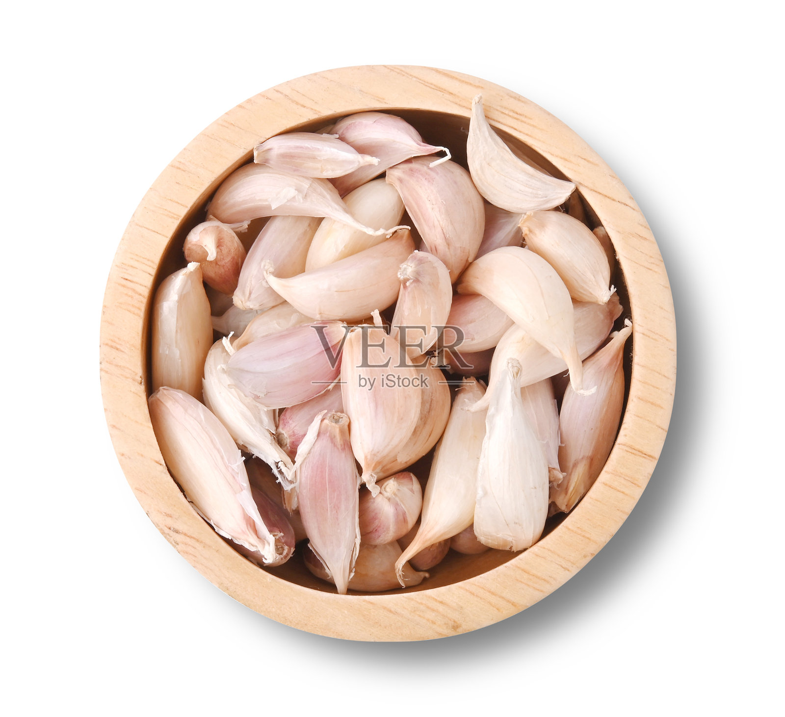 大蒜，木碗中的大蒜瓣，背景为白色照片摄影图片