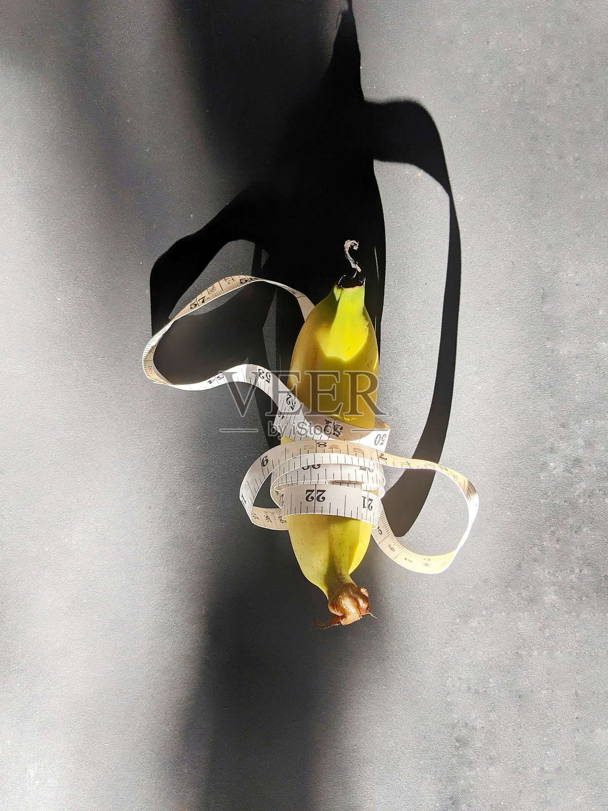 香蕉和卷尺照片摄影图片