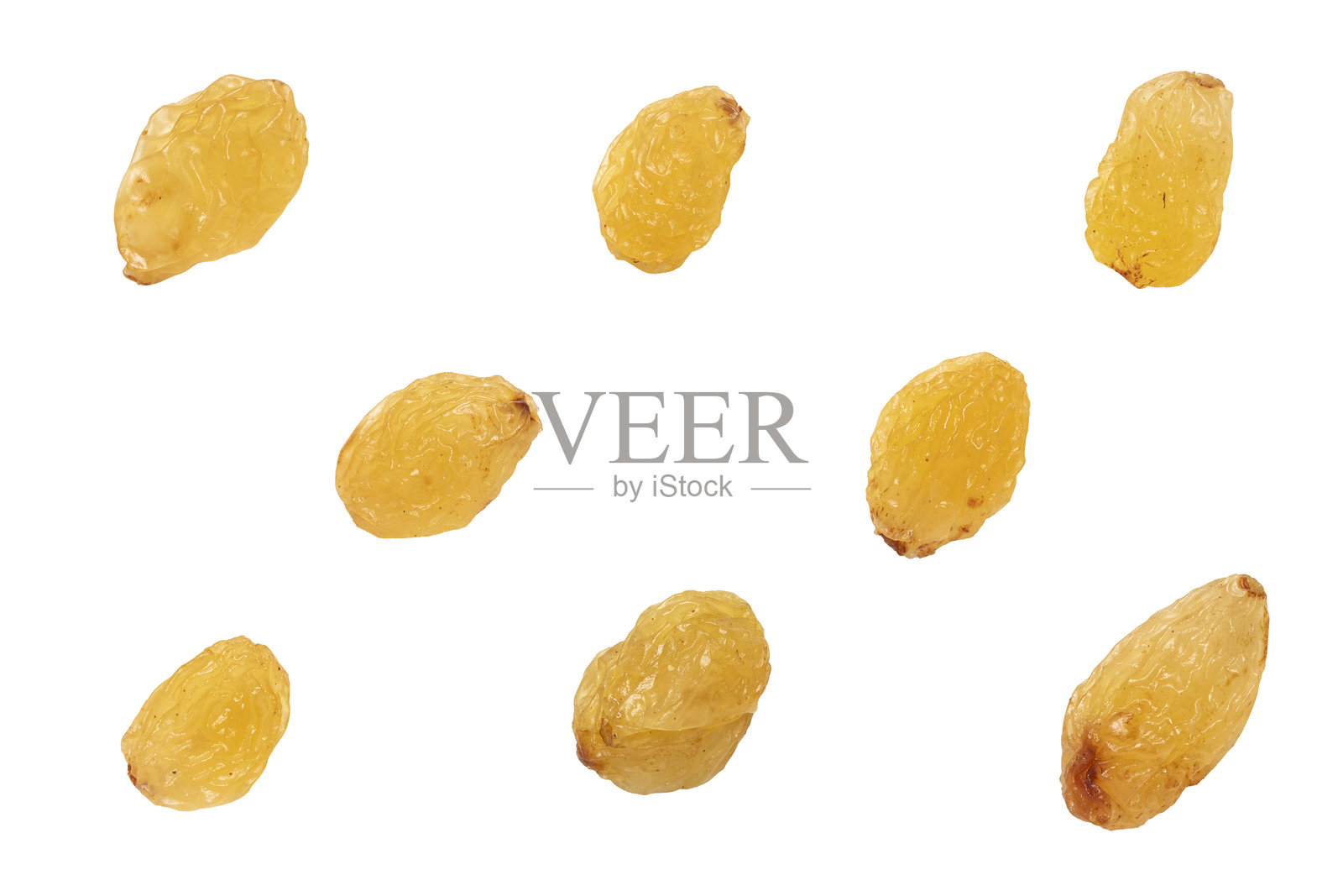 一组黄色葡萄干，孤立在白色背景上照片摄影图片