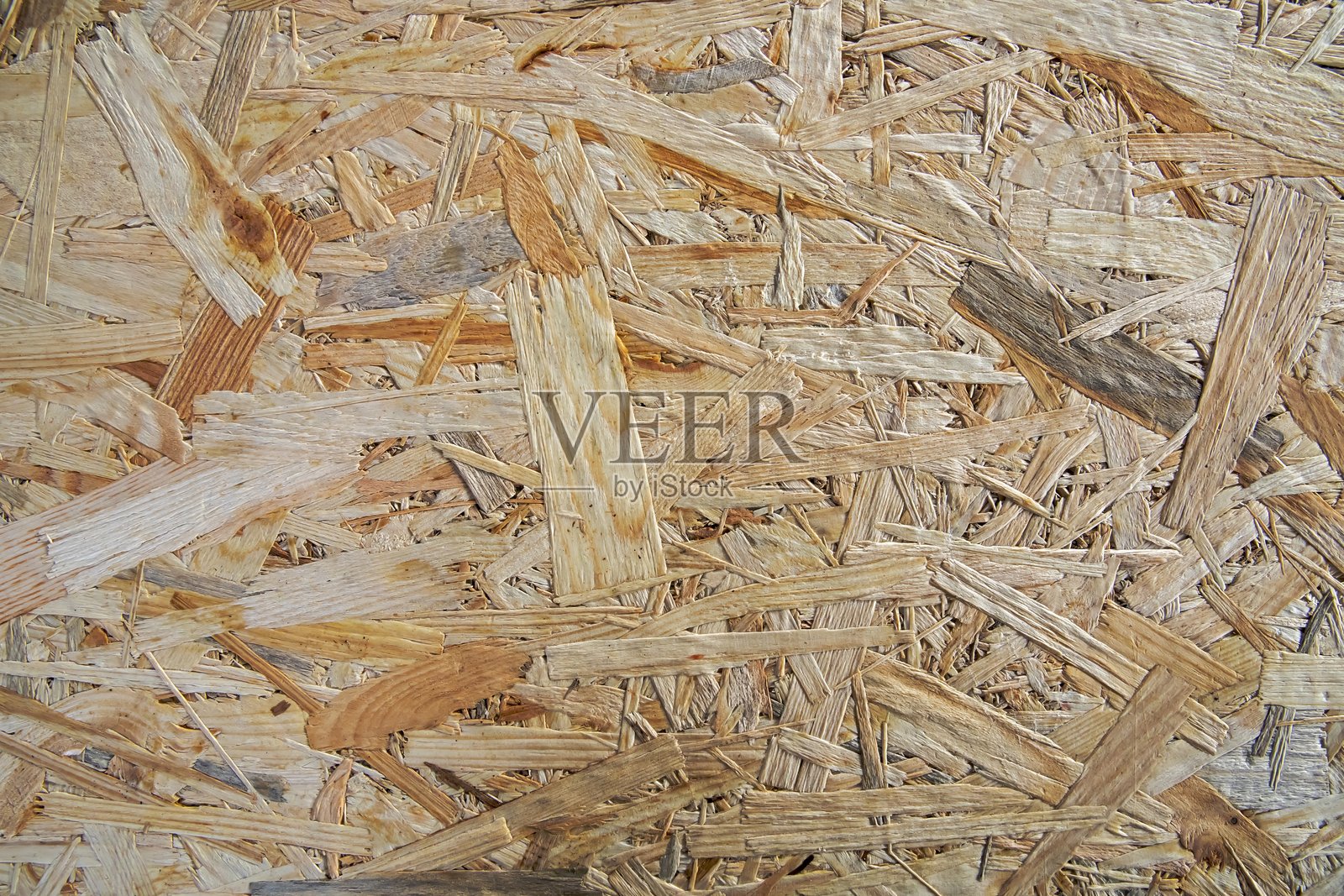 多彩木屑的OSB板特写纹理照片摄影图片