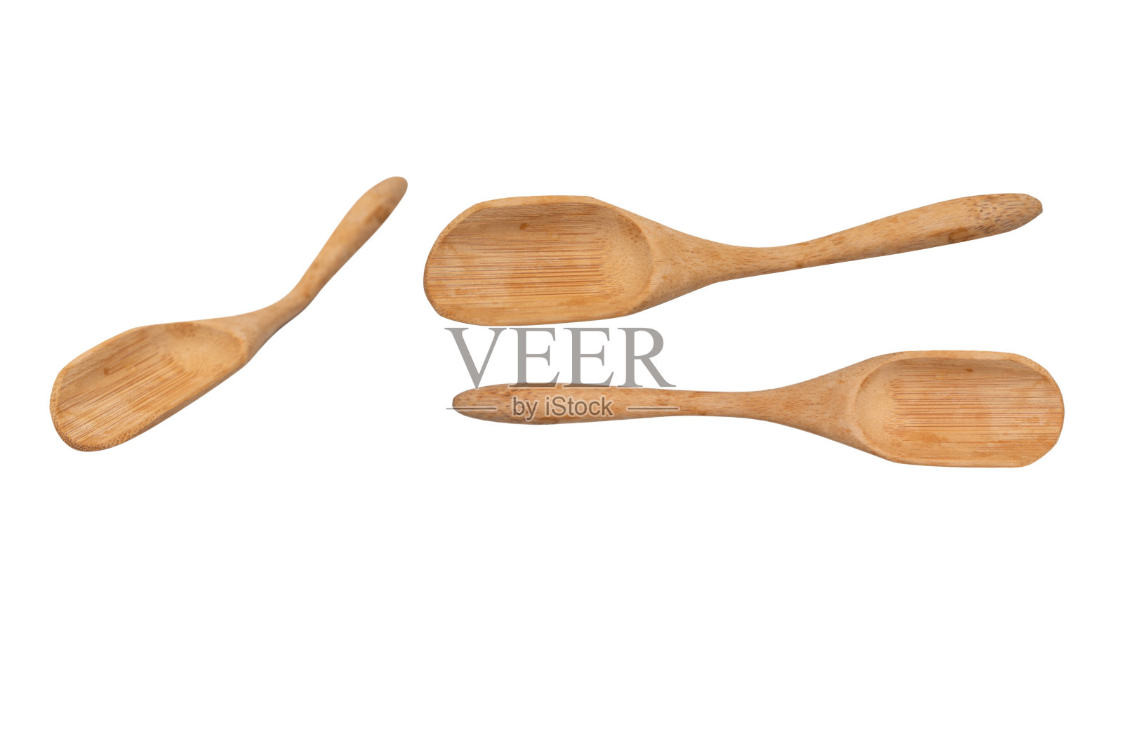 用于香料和茶的木制铲子，背景为白色。照片摄影图片