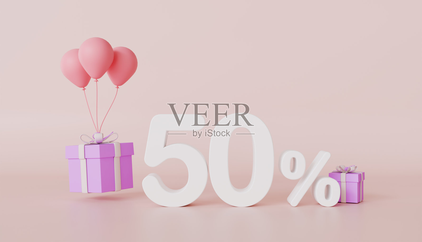 礼品盒和气球上带有五十个百分点标志，节日惊喜礼物，假日装饰照片摄影图片