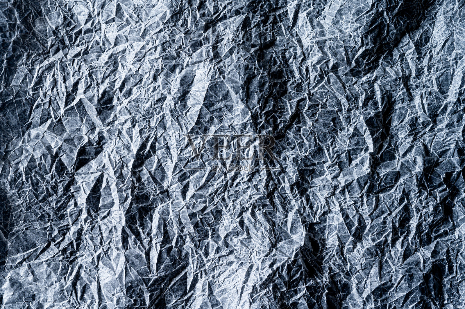 有纹理的彩色皱褶背景。特写。俯视图照片摄影图片