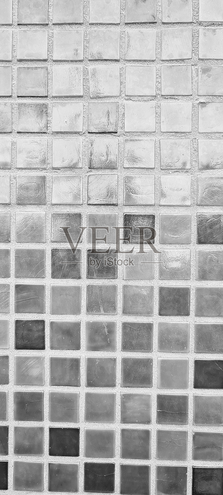 黑白色的小方形大理石瓷砖垂直表面的纹理照片摄影图片