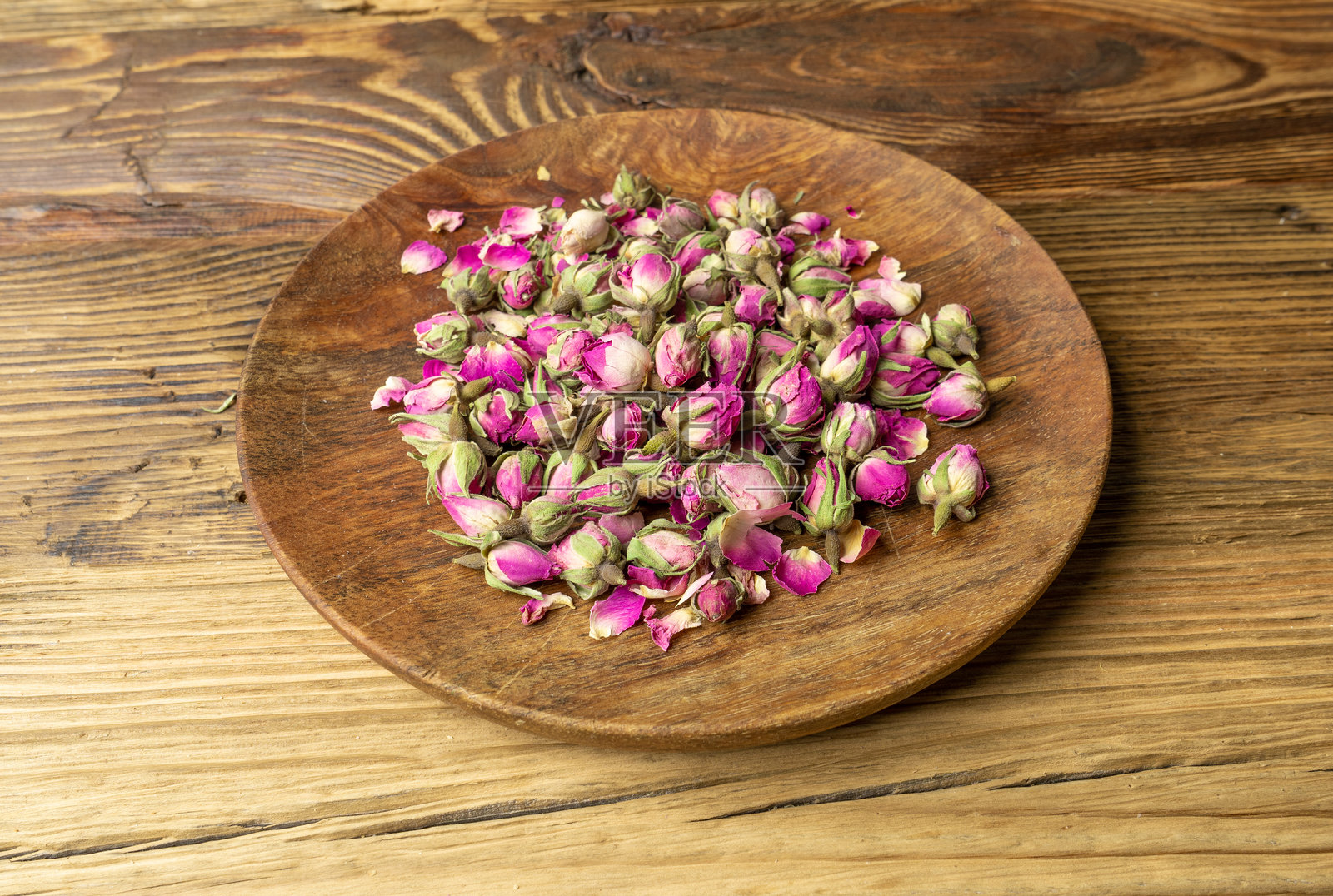 干玫瑰花蕾，玫瑰花瓣用于粉色花茶，干波斯玫瑰花蕾，质感玫瑰花蕾照片摄影图片