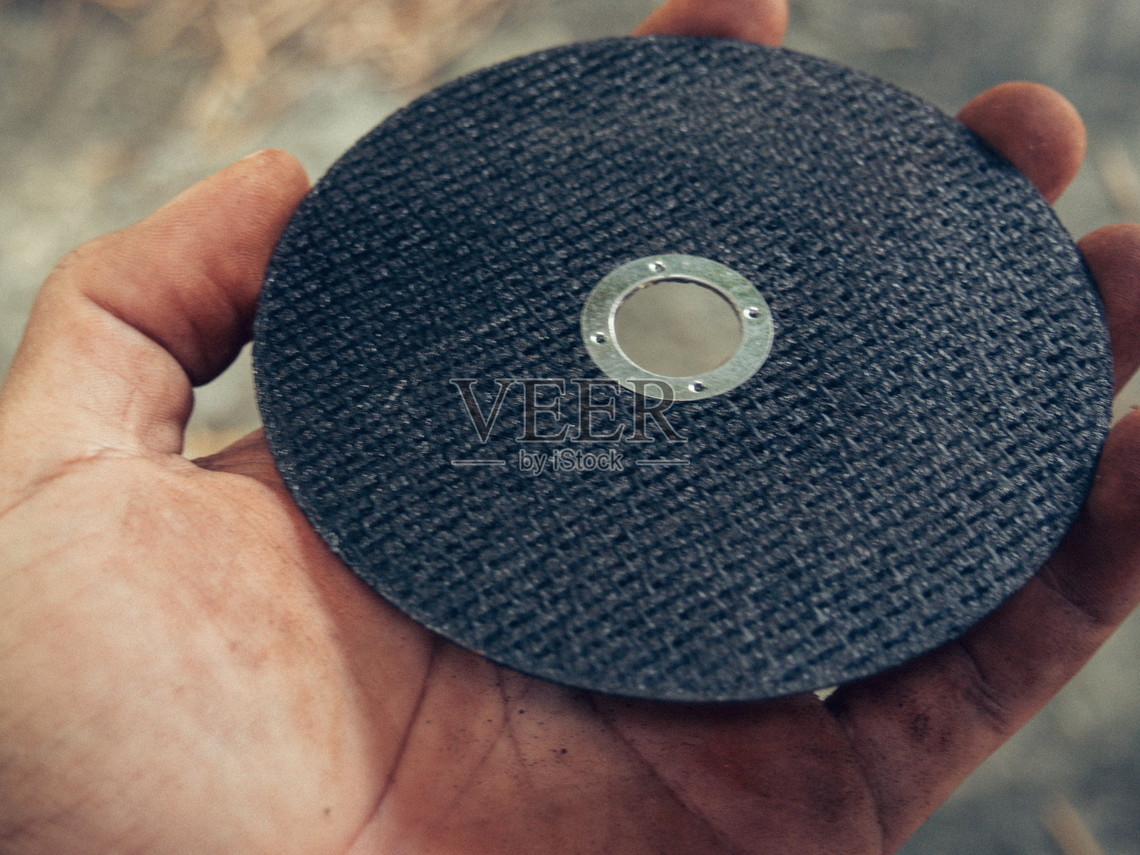 黑色角磨机刀片照片摄影图片