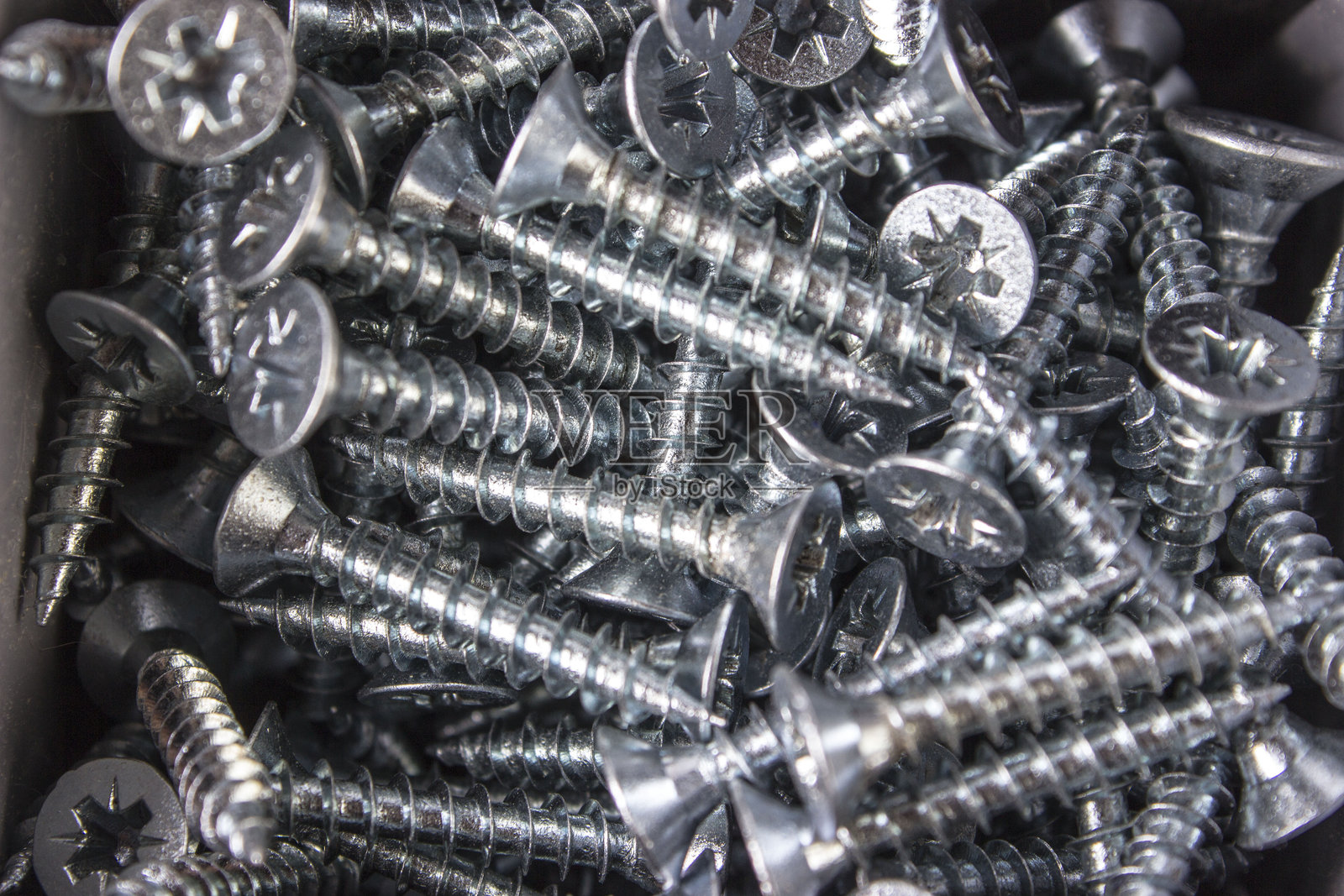 美丽的银色螺丝背景照片摄影图片